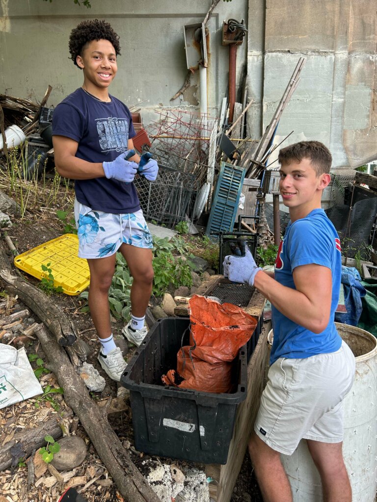 Students sifting compost at Prospect Farm.