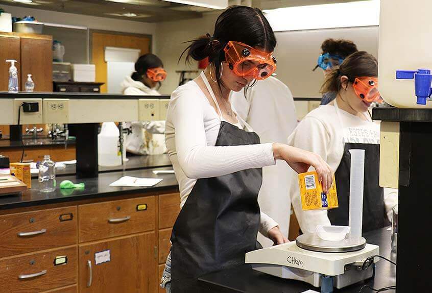 Student doing experiment in chemistry lab