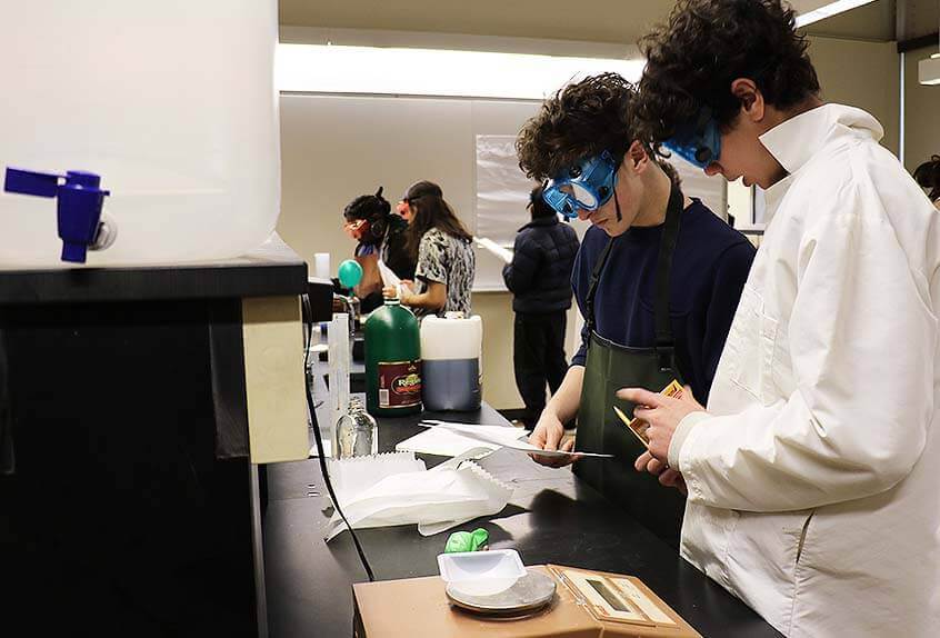 Student doing experiment in chemistry lab