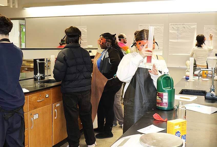 Student doing experiment in chemistry lab